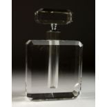 A LARGE RECTANGULAR GLASS SCENT BOTTLE AND STOPPER.