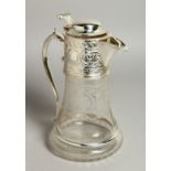 AN ETCHED GLASS AND SILVER PLATE CLARET JUG.