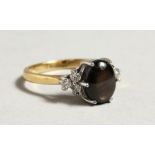 AN 18CT GOLD TIGERS EYE AND DIAMOND RING