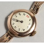 A LADIES’ VINTAGE GOLD ROLEX WRISTWATCH, the bracelet stamped 9ct CONNAUGHT.