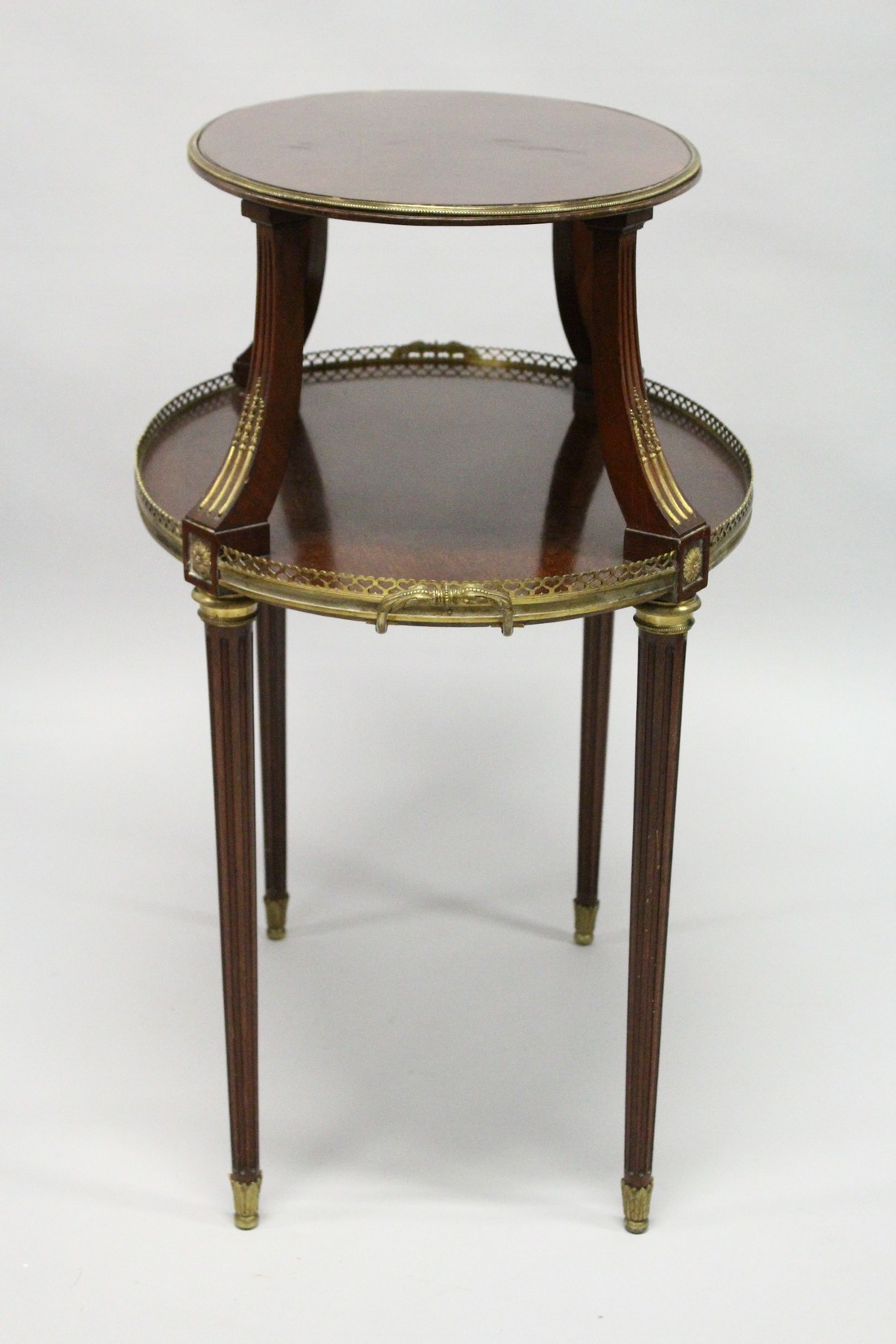 A VERY GOOD 19TH CENTURY MAHOGANY OVAL AND TWO TIER ETAGERE, with brass banding and gallery on - Image 6 of 6