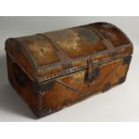 AN EARLY 19TH CENTURY MULE SKIN DOME TOP CHEST with carrying handles. 21ins long.