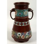 A LARGE CHINESE BRONZE TWO HANDLED CLOISONNE ENAMEL VASE. 13ins high.