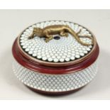 A PORCELAIN CIRCULAR BOX AND COVER the lid with a bronze lizard. 5ins diameter.