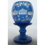 A SUPERB LARGE BOHEMIAN BLUE BOWL ON STAND, engraved with fruiting vines and eight engravings of