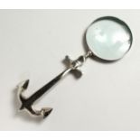 A MOULDED CHROME ANCHOR MAGNIFYING GLASS.
