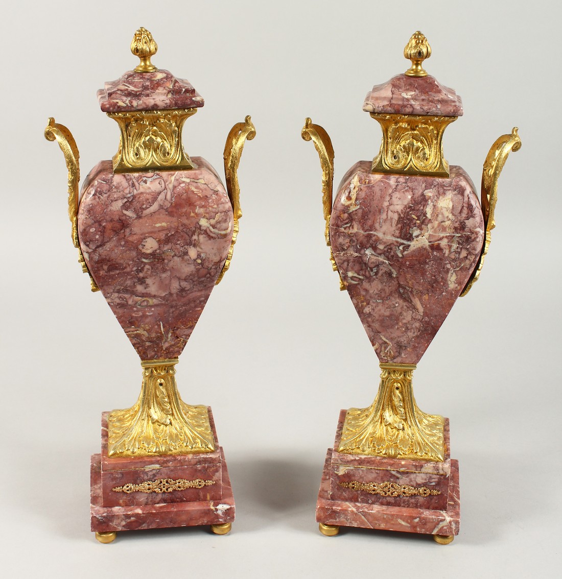 A GOOD PAIR OF MARBLE AND ORMOLU TWO HANDLED SIDE PIECES. 15ins high.