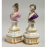 A GOOD SMALL PAIR OF MEISSEN PORCELAIN CLASSICAL BUSTS on gilt white pedestals. 11cm high, Cross