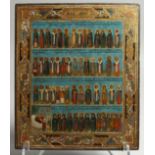 A GOOD RUSSIAN ICON with four rows of saints. 12ins x 10ins