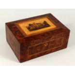 A TUNBRIDGE WARE SEWING BOX, the lid with a building in micro mosaic. 12ins long.