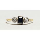 AN 18CT GOLD THREE STONE SAPPHIRE AND DIAMOND RING.