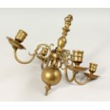 A SMALL 18TH CENTURY DUTCH BRASS FOUR BRANCH CHANDELIER. 1ft long.