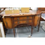 A mahogany sideboard and matching serving table.