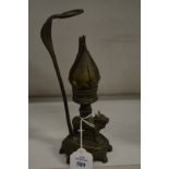 An unusual eastern brass lamp.