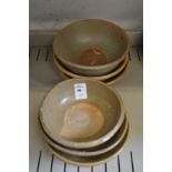 Six small Chinese terracotta bowls.