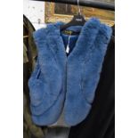 A Jayley Collection blue faux fur gilet.