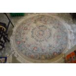 A Chinese circular rug.