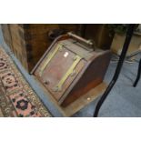 A Victorian walnut and brass coal box.