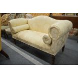 A small Victorian style scroll end settee.