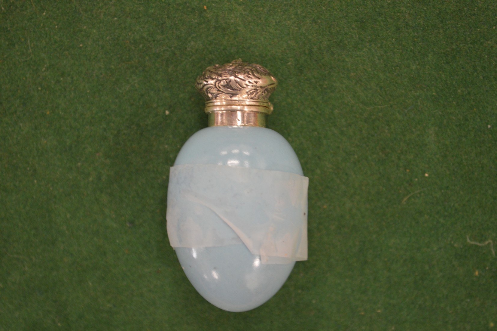 A silver mounted egg shaped scent bottle (AF).