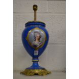 A decorative French porcelain and ormolu lamp base.