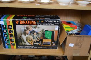A Binatone TV game, boxed and other items.