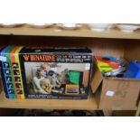 A Binatone TV game, boxed and other items.