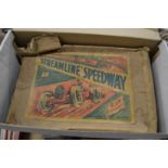A Louis Marx tin-plate Streamline Speedway toy, complete with remnants of original box.