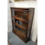 An oak three section bookcase, probably Globe Wernicke.