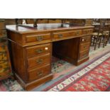 A Victorian mahogany pedestal desk.