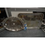 Two silver plated twin handled trays.