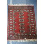 A small Bokhara rug.