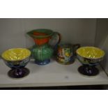 A pair of Maling lustre ware grapefruit bowls and two other items.