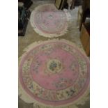 Two Chinese pink ground rugs.