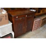 A Victorian walnut sideboard.