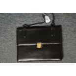 A black leather handbag.