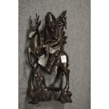 A Chinese carved wood and silver wire inlaid model of a priest on a deer.