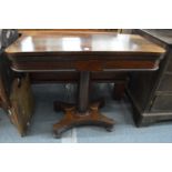 A 19th century rosewood foldover card table.