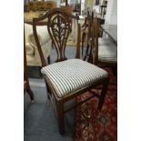 A set of six George III design mahogany dining chairs.