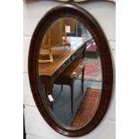 An oval mirror.