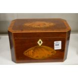 A Georgian mahogany tea caddy with shell inlaid decoration.