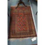 A small Bokhara prayer rug.