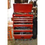 A workshop tool chest / trolley containing numerous tools.