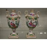 A pair of Samson of Paris porcelain twin handled pedestal vases.