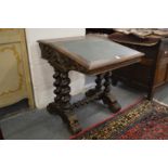 A Victorian carved oak desk.