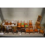 A quantity of wooden model chairs and a corner cabinet (several AF).