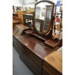 An Edwardian inlaid mahogany dressing chest.