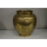 A Chinese engraved brass jar.