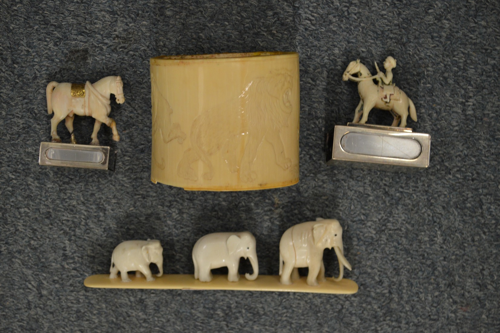 Carved elephants and other similar items.