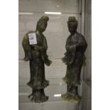 A pair of Chinese carved jadeite figurines.